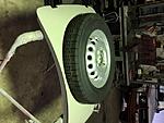 boot lid completed, trying the spare with new tire out for fit