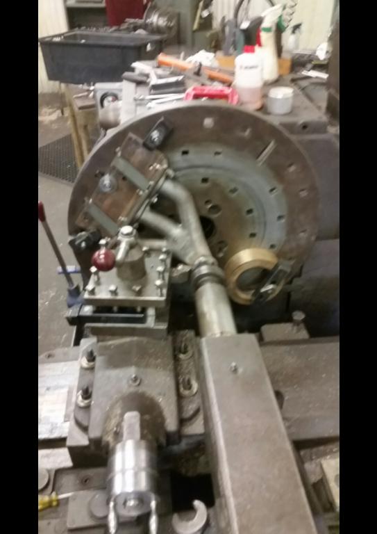 Exhaust manifold threads being machined