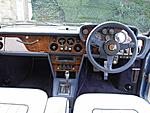 Black PVC dash now replaced with colour matched leather. Air Con now integrated.