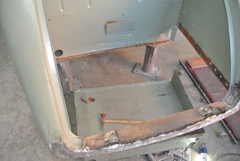 Rusted boot floor removed to fabricate new one, the boot bottom panel and timber frame had also rotted away.
