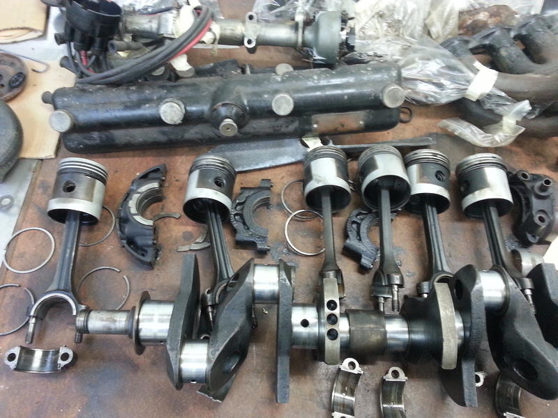 engine disassembled. Modifications will include bigger valves and competition springs, high compression pistons, camshaft grind to increase overlap, SU carbs to be retuned, estimated power up to 100 HP