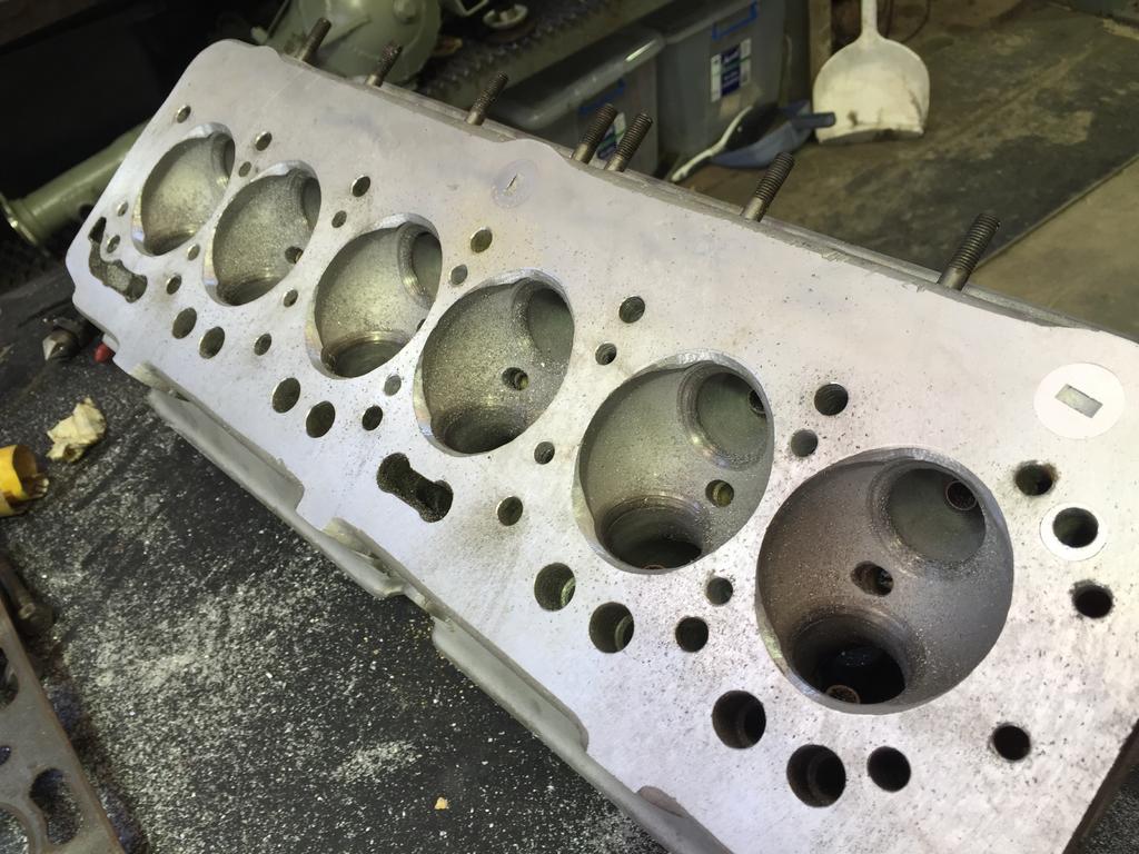 Cylinder head after cleaning and machining. Extra aluminium ground out in way of valves, water jacket holes drilled out