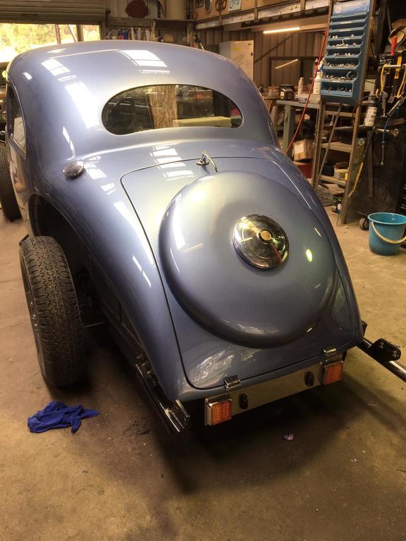 Back from the painter and bolting on the body panels